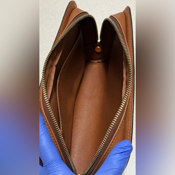 Louis Vuitton Orsay Monogram Canvas clutch bag. - Picture 9 of 13